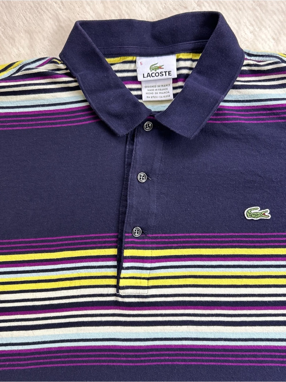 Lacoste Navy Polo with Yellow Purple and Light Blue Stripes Made in France Large